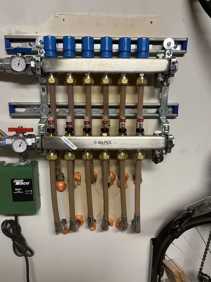 Plumber performing Water Heater Repair at a residential property in Chesterfield